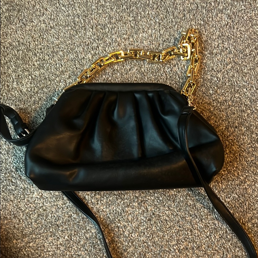 Elegant Black Leather Bag with Gold Chain